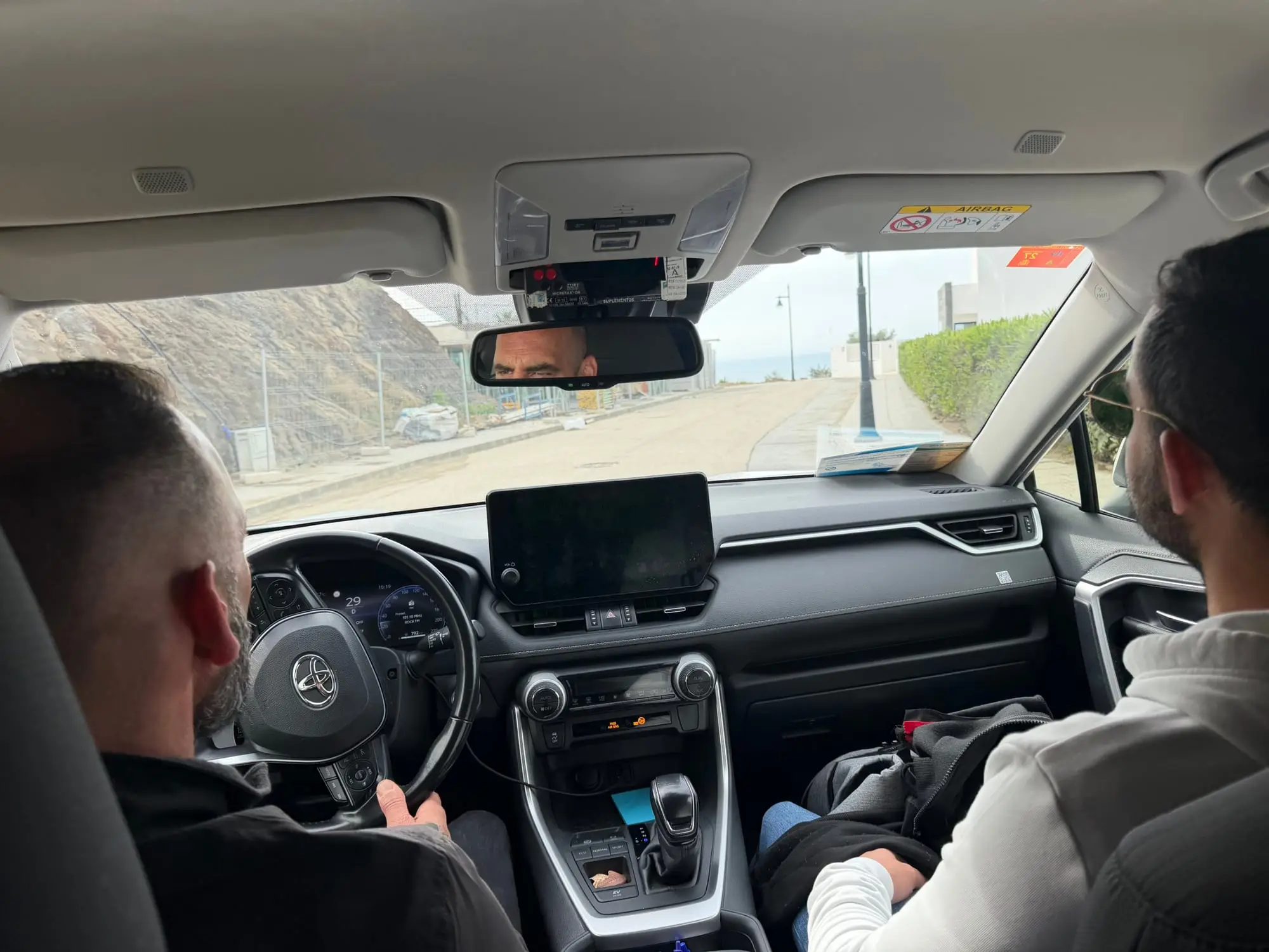Inside the Torrox taxi during a journey with a passenger